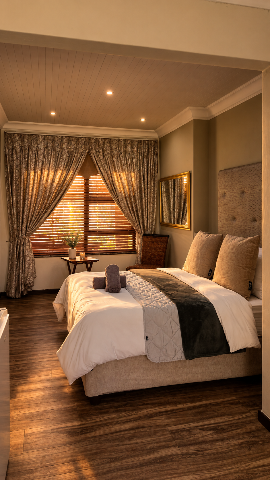 Sunlit bedroom in Room 12 at Big 5 Guesthouse