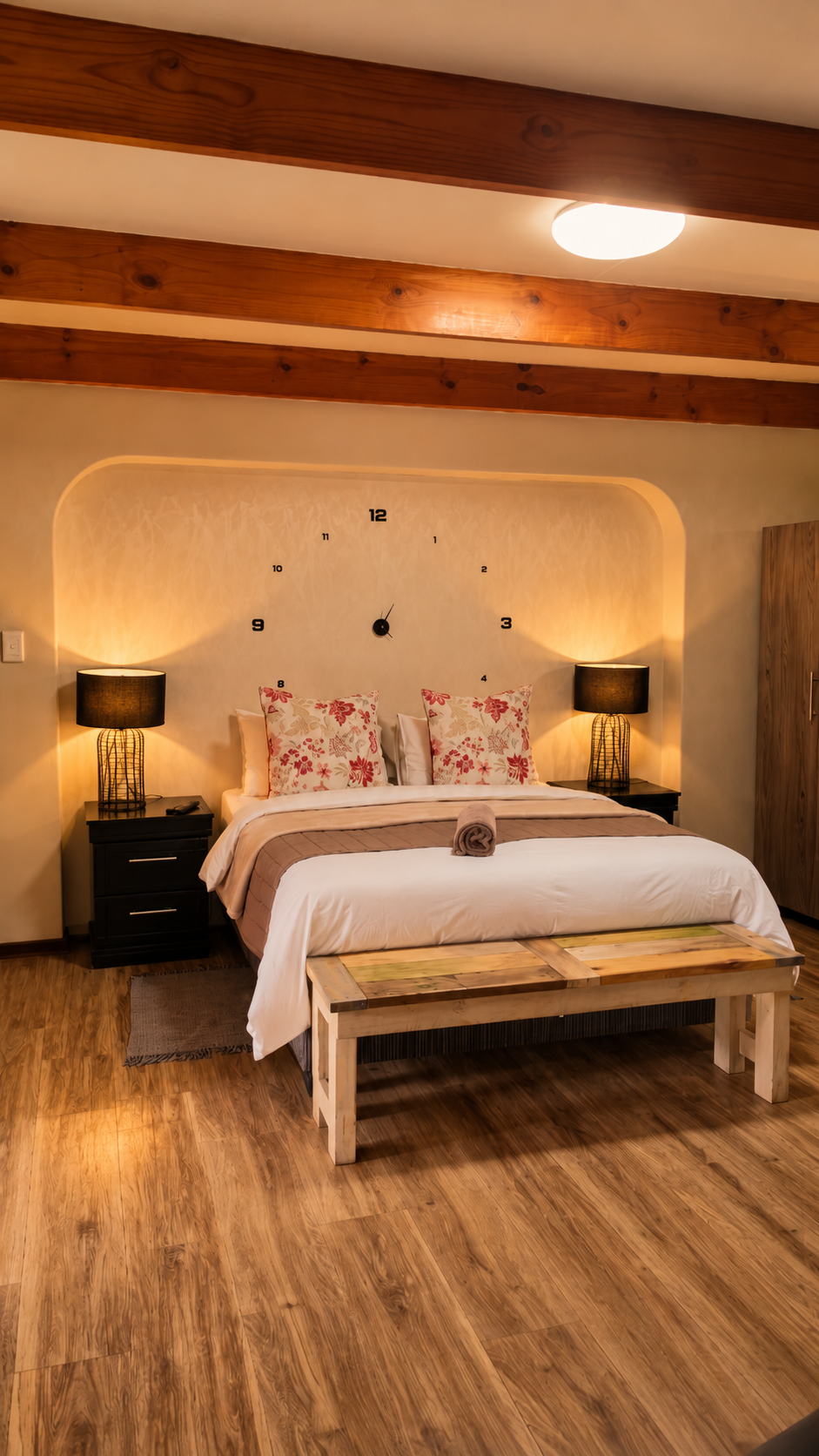 Room 14 with exposed wooden ceiling beams at Big 5 Guesthouse