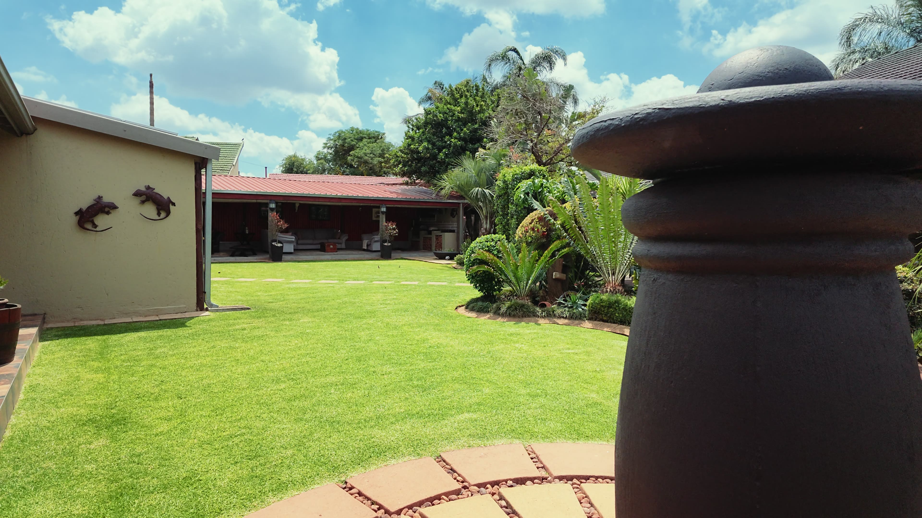 Tropical garden grounds at Big 5 Guesthouse, Kempton Park